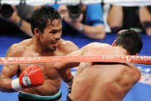 How old is Pacquiao in boxing?